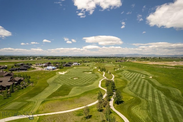 aerial view featuring a mountain view and golf course view