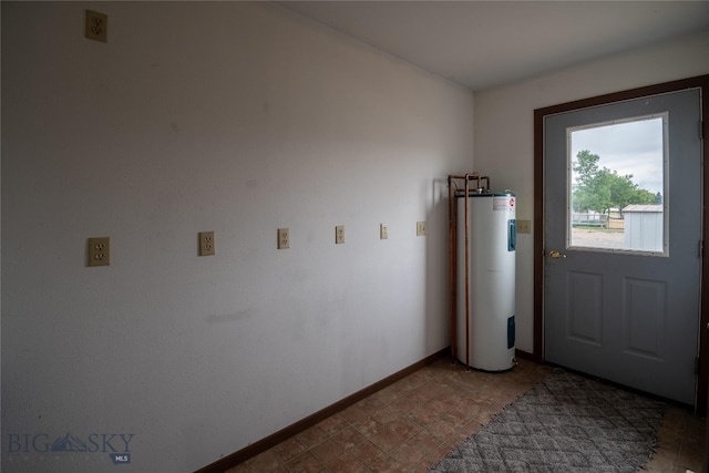 doorway to outside with electric water heater and tile patterned floors