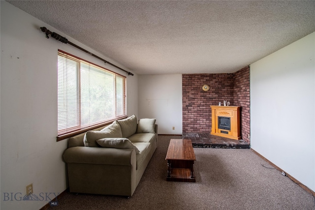 living room featuring brick wall, a textured ceiling, carpet floors, and a brick fireplace