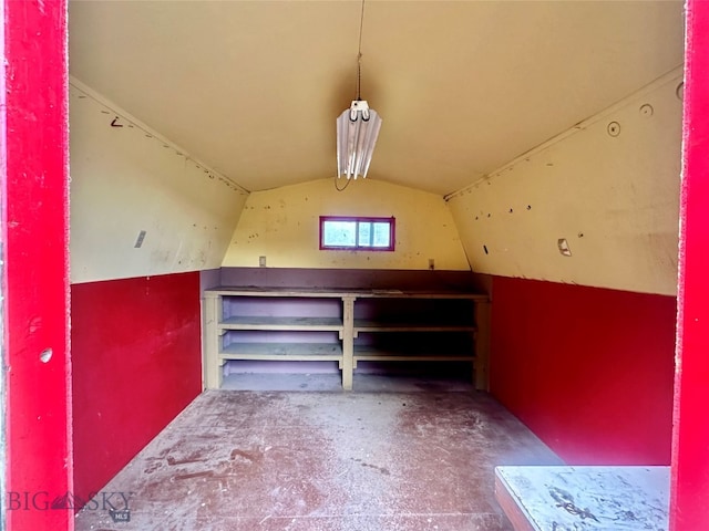 bonus room featuring vaulted ceiling