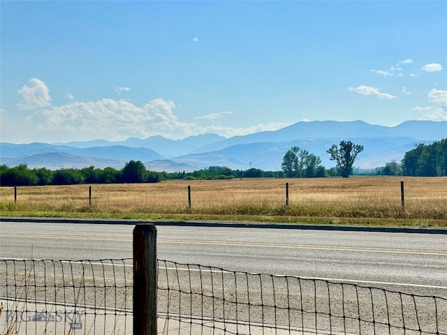 view of mountain feature with a rural view