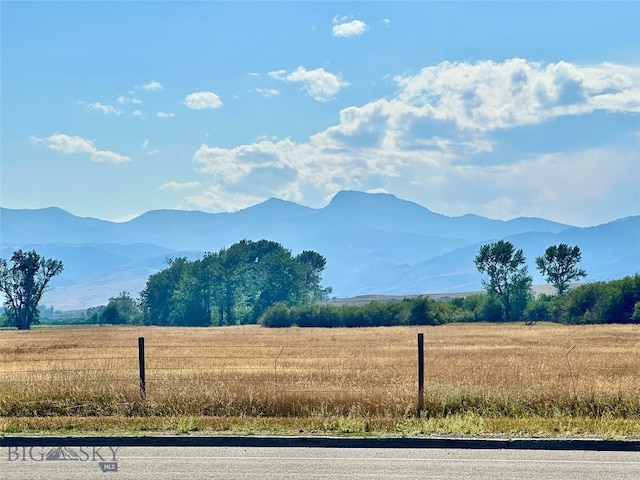 view of mountain feature with a rural view