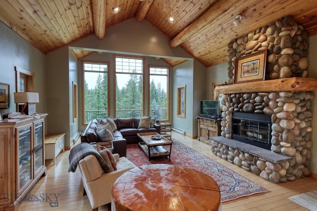 83 W Pine Cone Ter, Big Sky, MT 59716 - living area with a stone fireplace, hardwood / wood-style flooring, wood ceiling, baseboards, and beverage cooler