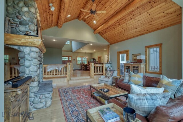 83 W Pine Cone Ter, Big Sky, MT 59716 - living room with wood finished floors, high vaulted ceiling, a ceiling fan, wood ceiling with exposed beams, and recessed lighting