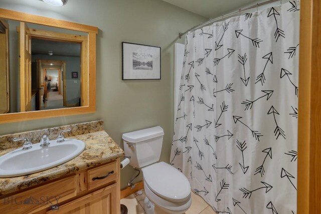 83 W Pine Cone Ter, Big Sky, MT 59716 - bathroom featuring vanity, toilet, and a shower with curtain