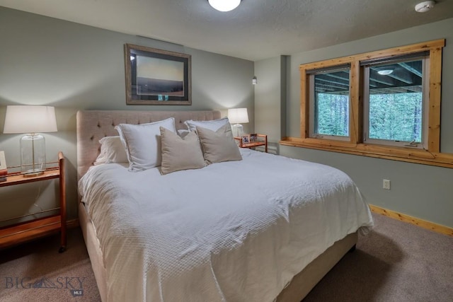 83 W Pine Cone Ter, Big Sky, MT 59716 - bedroom featuring carpet floors and baseboards