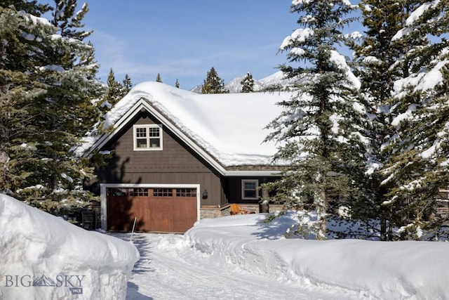 83 W Pine Cone Ter, Big Sky, MT 59716 - chalet / cabin featuring stone siding