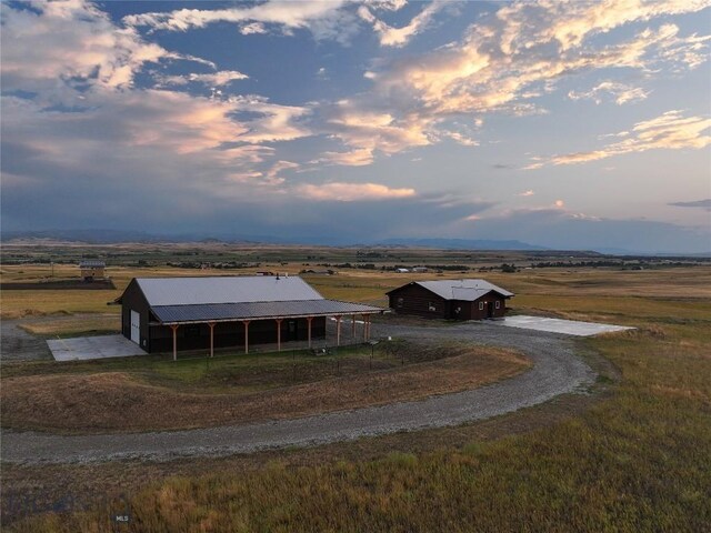 aerial view at dusk with a rural view