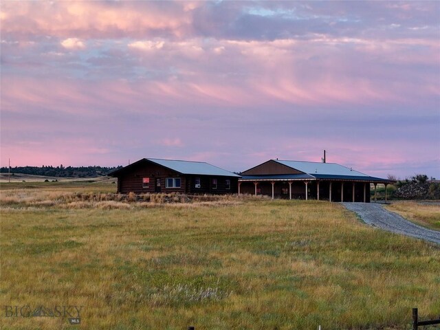 view of front of home with a carport