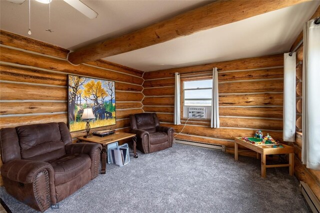 living area with a baseboard heating unit, beamed ceiling, and carpet