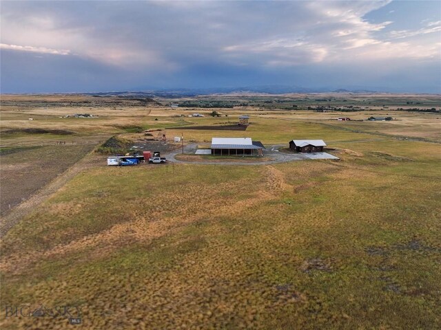 birds eye view of property featuring a rural view