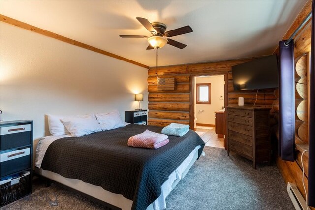 carpeted bedroom with ensuite bathroom, ceiling fan, a baseboard radiator, rustic walls, and ornamental molding