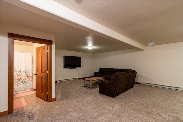 living room with light carpet and a baseboard radiator