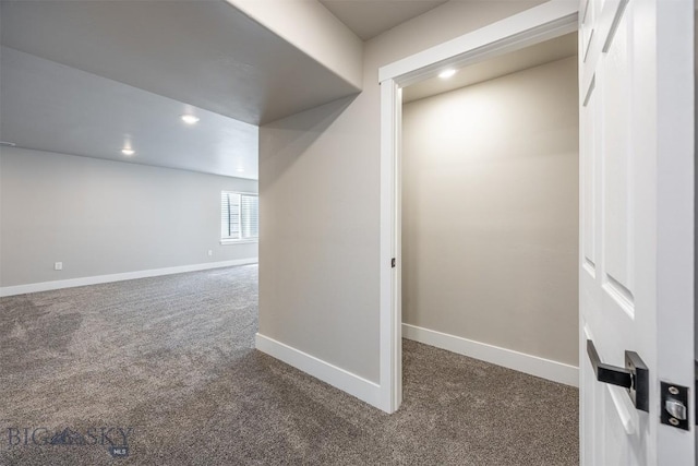 basement with dark carpet