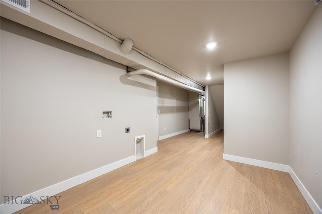 basement with light wood-type flooring