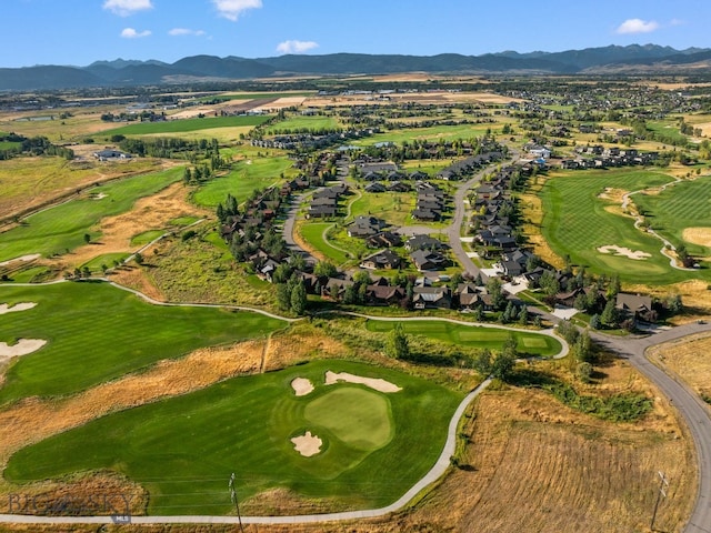 birds eye view of property featuring a mountain view