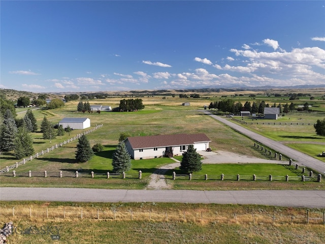 view of community with a rural view