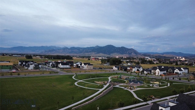 bird's eye view with a residential view and a mountain view