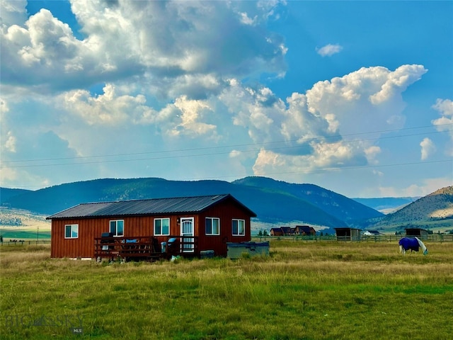 view of mountain feature featuring a rural view