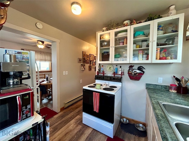 kitchen with ceiling fan, baseboard heating, electric range, hardwood / wood-style floors, and white cabinetry