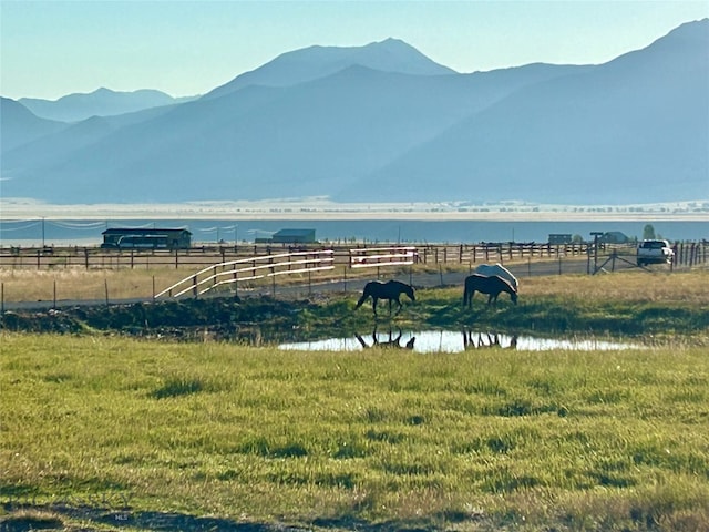 property view of mountains with a rural view and a water view