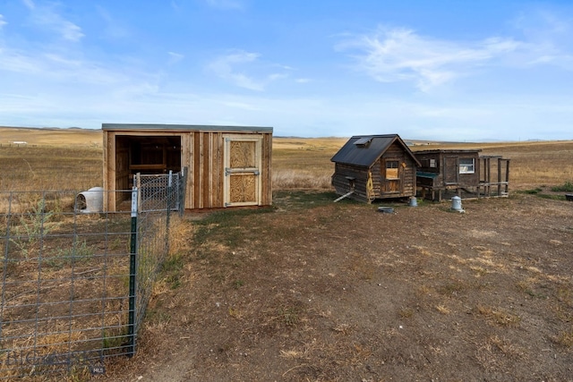 view of outdoor structure featuring a rural view