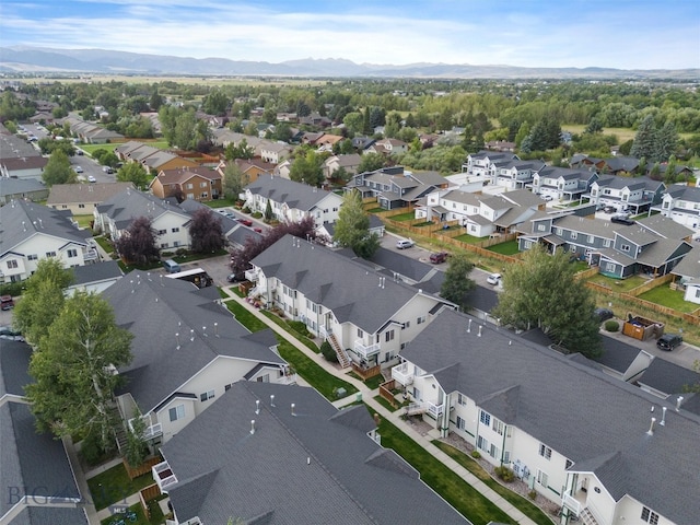 birds eye view of property featuring a mountain view