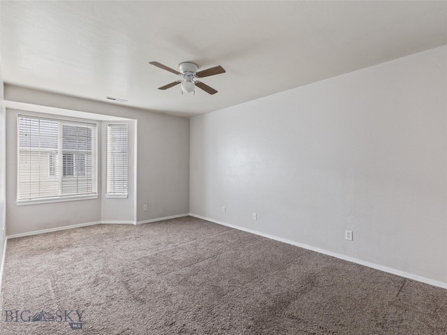 carpeted empty room with ceiling fan