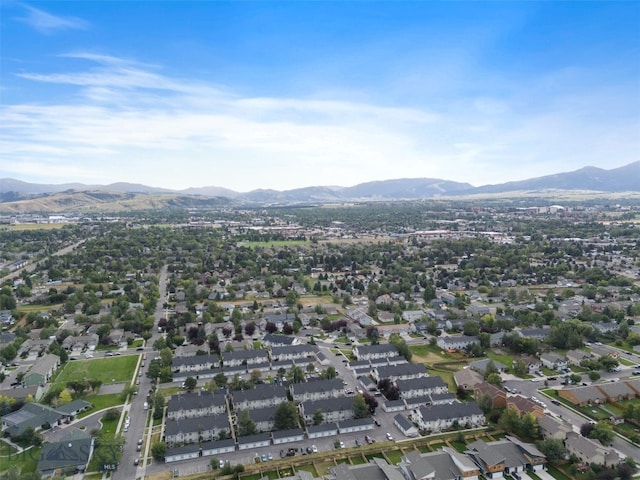 birds eye view of property featuring a mountain view