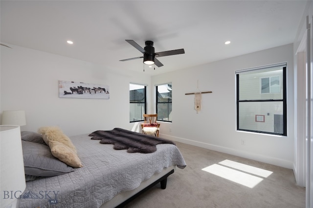 carpeted bedroom with ceiling fan