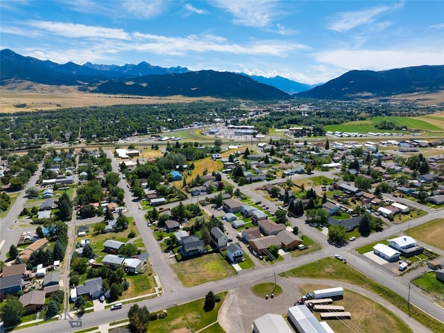 birds eye view of property featuring a mountain view