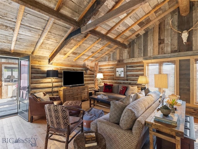 living area featuring wooden ceiling, hardwood / wood-style flooring, log walls, and beam ceiling