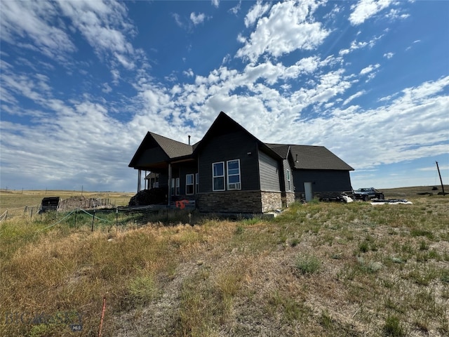 exterior space with a rural view