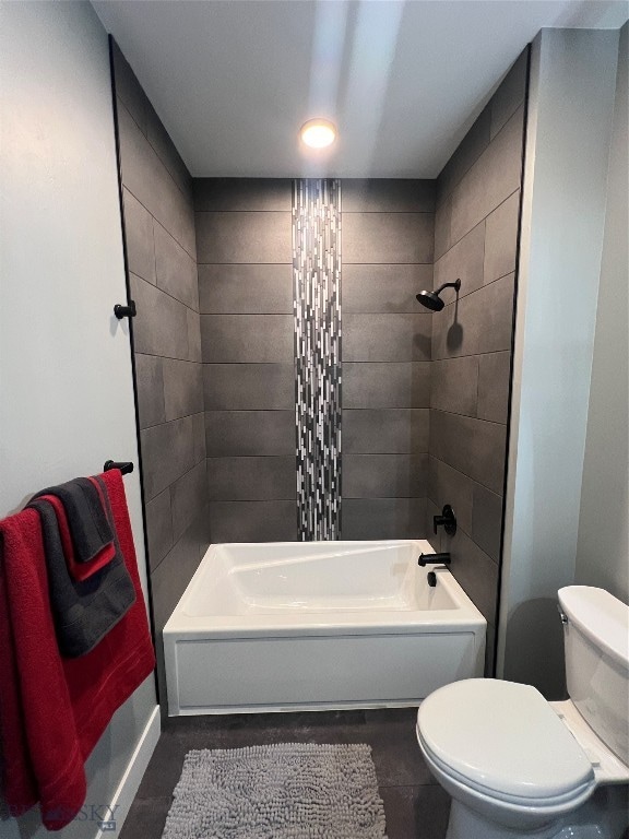 bathroom with toilet and shower / bath combo with shower curtain