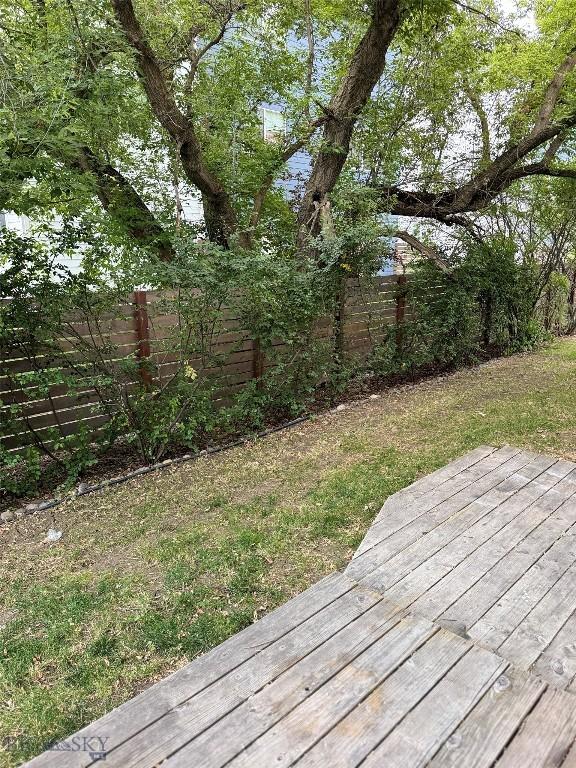 view of yard with a wooden deck