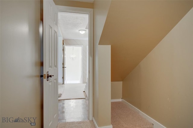 8733 Huffman, Bozeman, MT 59715 - hall with baseboards and carpet floors