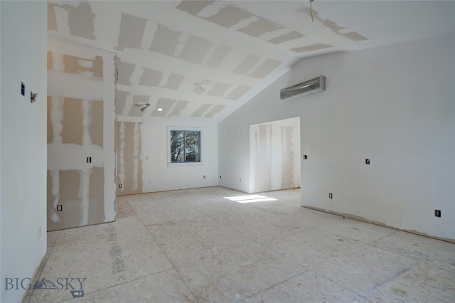 unfurnished living room with lofted ceiling