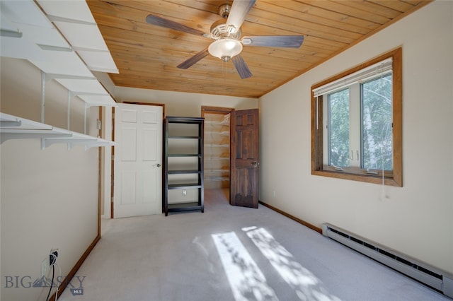 unfurnished bedroom with ceiling fan, baseboard heating, light carpet, and wooden ceiling