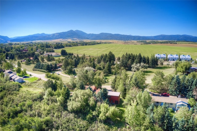 aerial view featuring a rural view and a mountain view