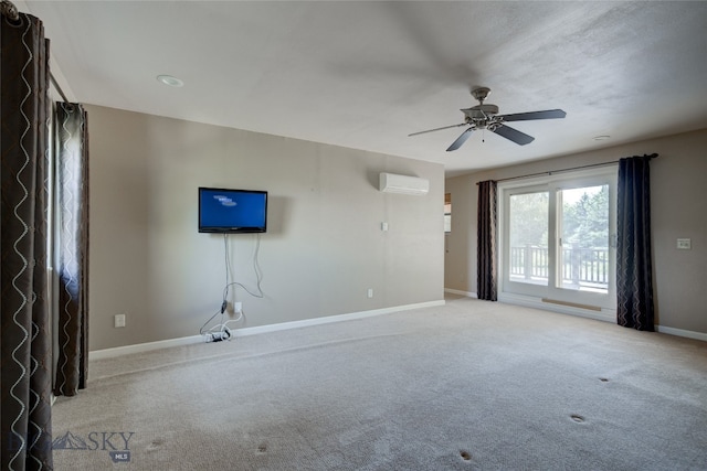 unfurnished living room featuring carpet flooring, ceiling fan, and a wall unit AC