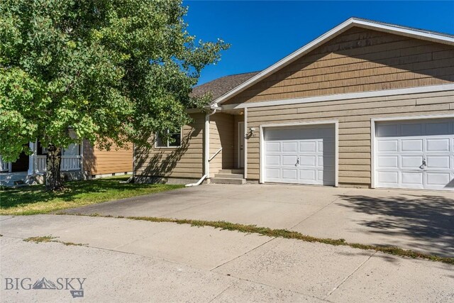 view of front of home with a garage