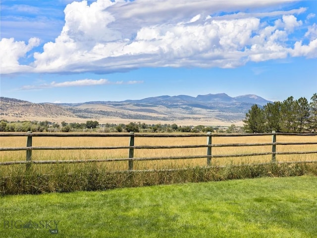 property view of mountains featuring a rural view