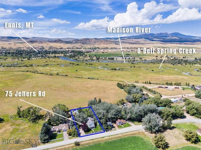 aerial view featuring a mountain view and a rural view