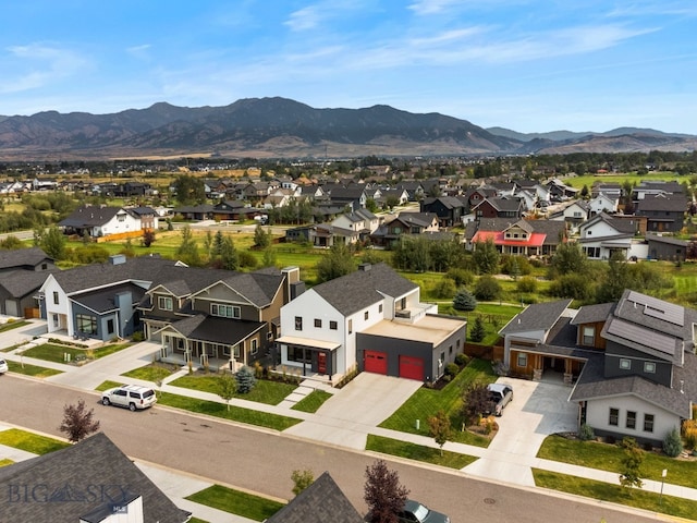 bird's eye view featuring a mountain view and a residential view