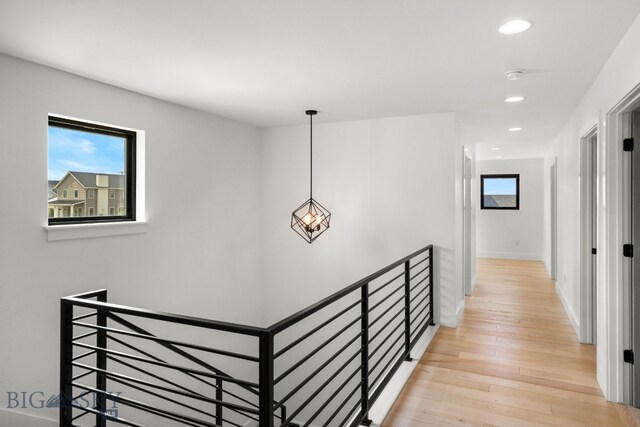 hallway with light wood-type flooring