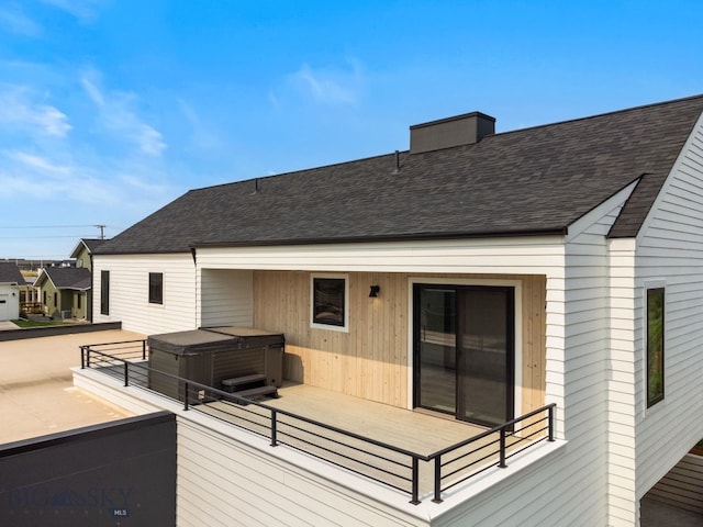 deck with a hot tub