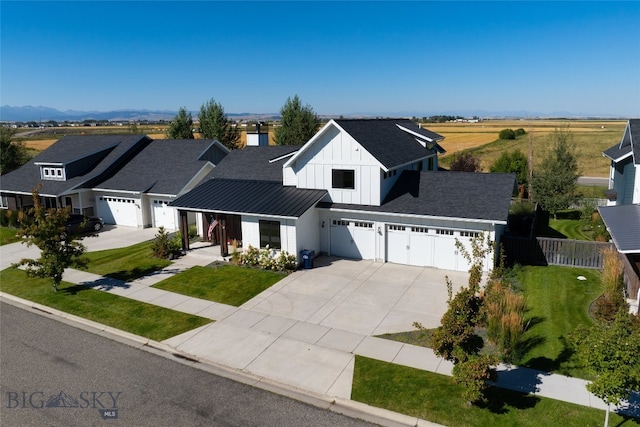 modern farmhouse featuring a garage