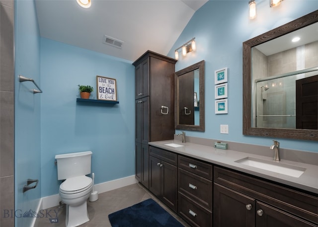 bathroom with toilet, a shower with door, tile patterned flooring, vanity, and lofted ceiling