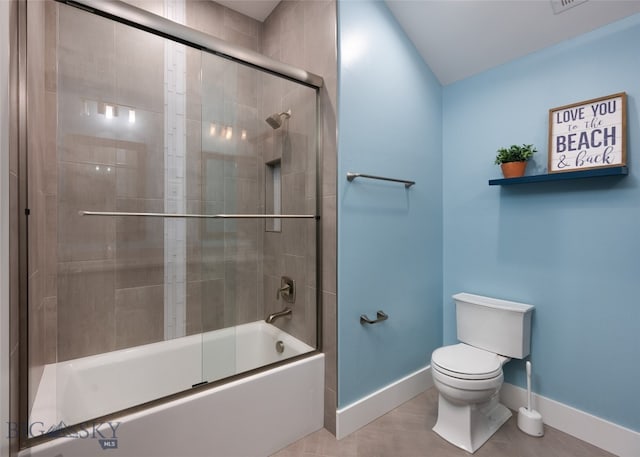 bathroom with toilet, tile patterned floors, and enclosed tub / shower combo