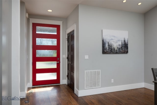 foyer with dark hardwood / wood-style floors